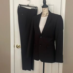 Young men’s suit from Men’s Warehouse  Egara Extreme Slim Fit 36 Regular jkt
